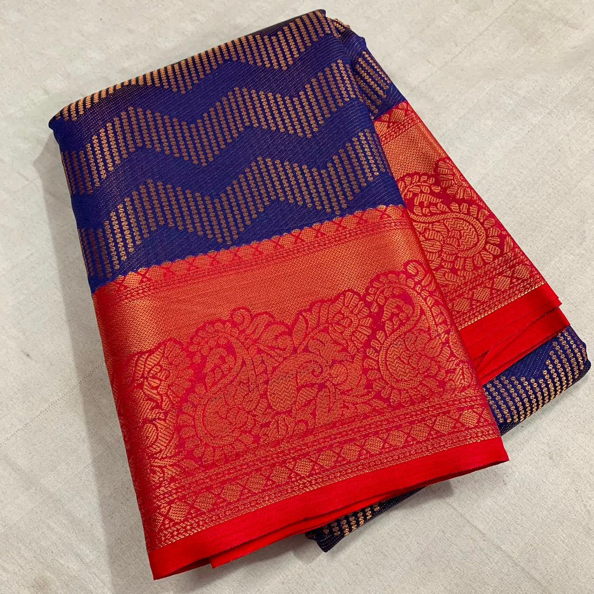 Vairoosi zigzag pattern in semi Kanchi silk saree with contrast rich pallu and contrast brocade blouse