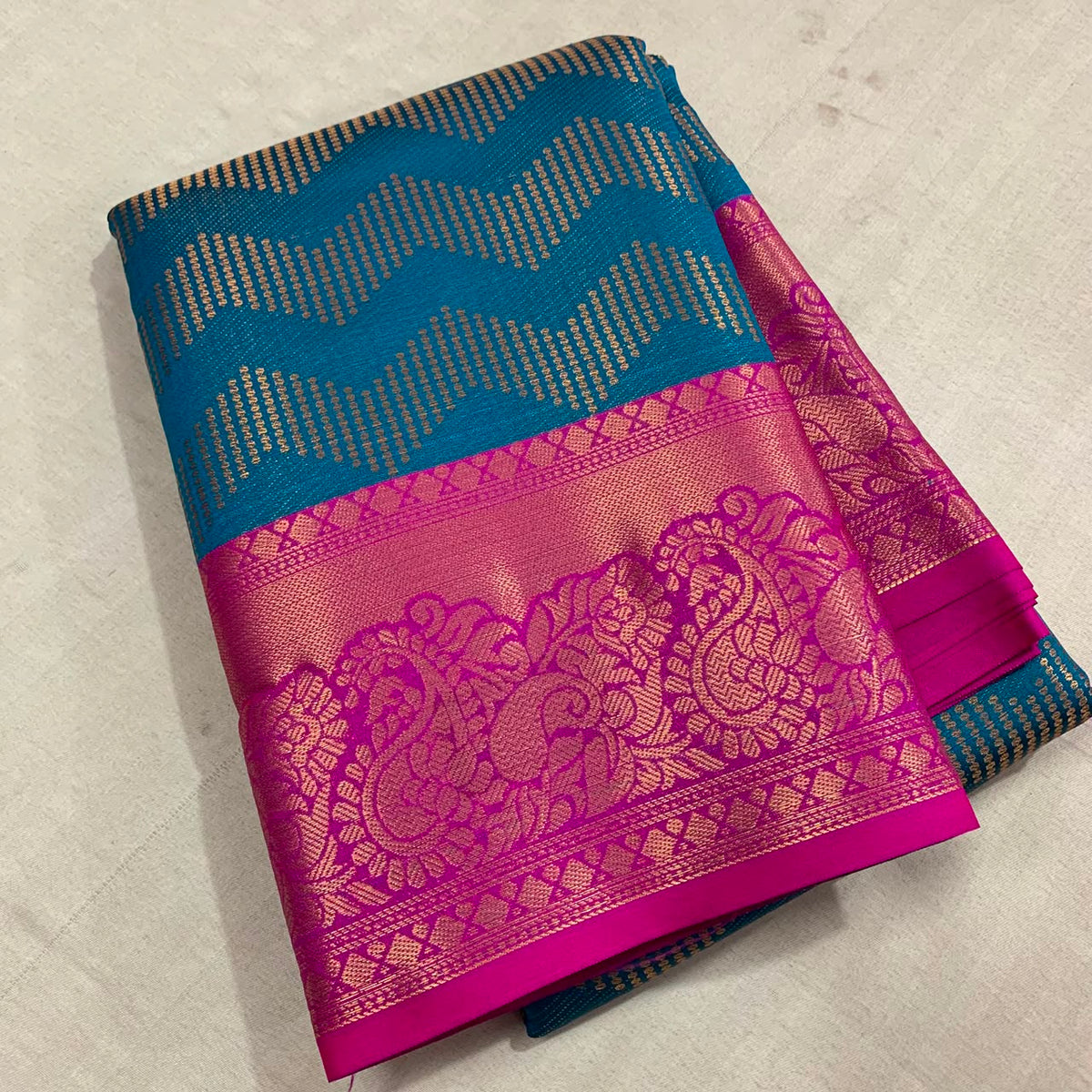 Vairoosi zigzag pattern in semi Kanchi silk saree with contrast rich pallu and contrast brocade blouse