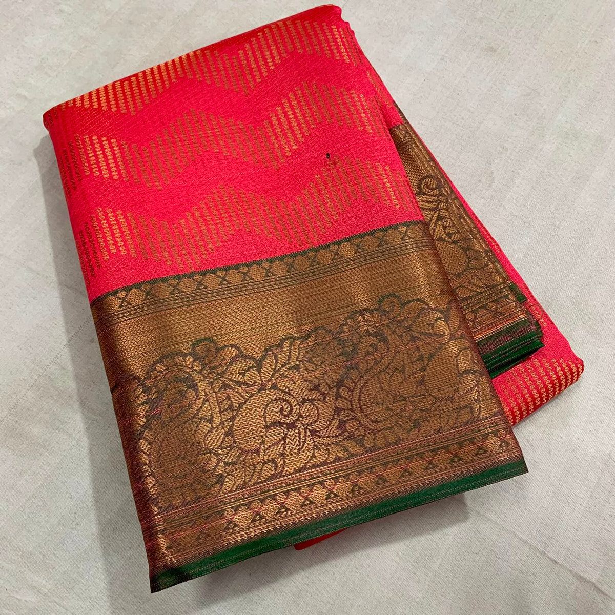 Vairoosi zigzag pattern in semi Kanchi silk saree with contrast rich pallu and contrast brocade blouse