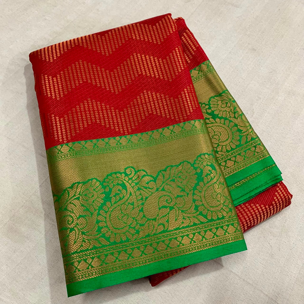 Vairoosi zigzag pattern in semi Kanchi silk saree with contrast rich pallu and contrast brocade blouse